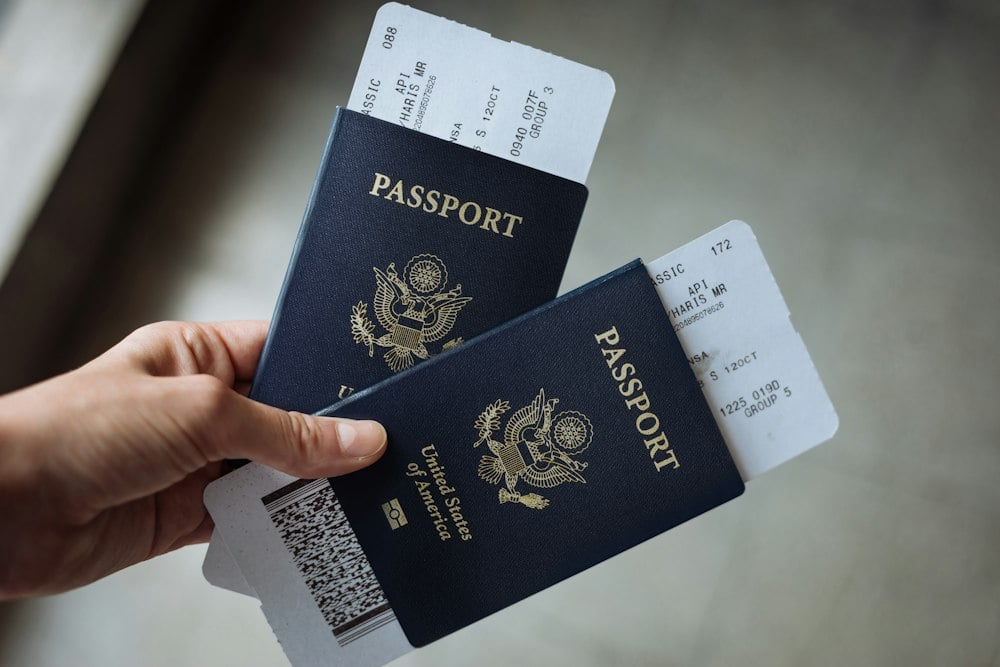 Two U.S. passports with boarding passes